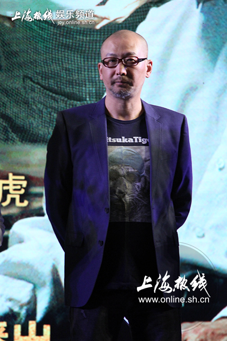管虎  